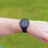 Black G6 on wrist with hazards on screen