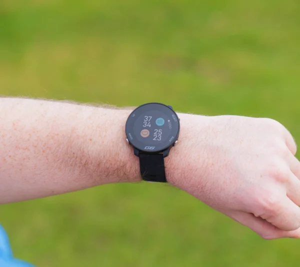 Black G6 on wrist with hazards on screen