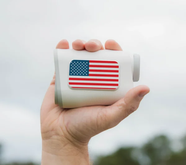Golfer holding PRO X with US flag plate