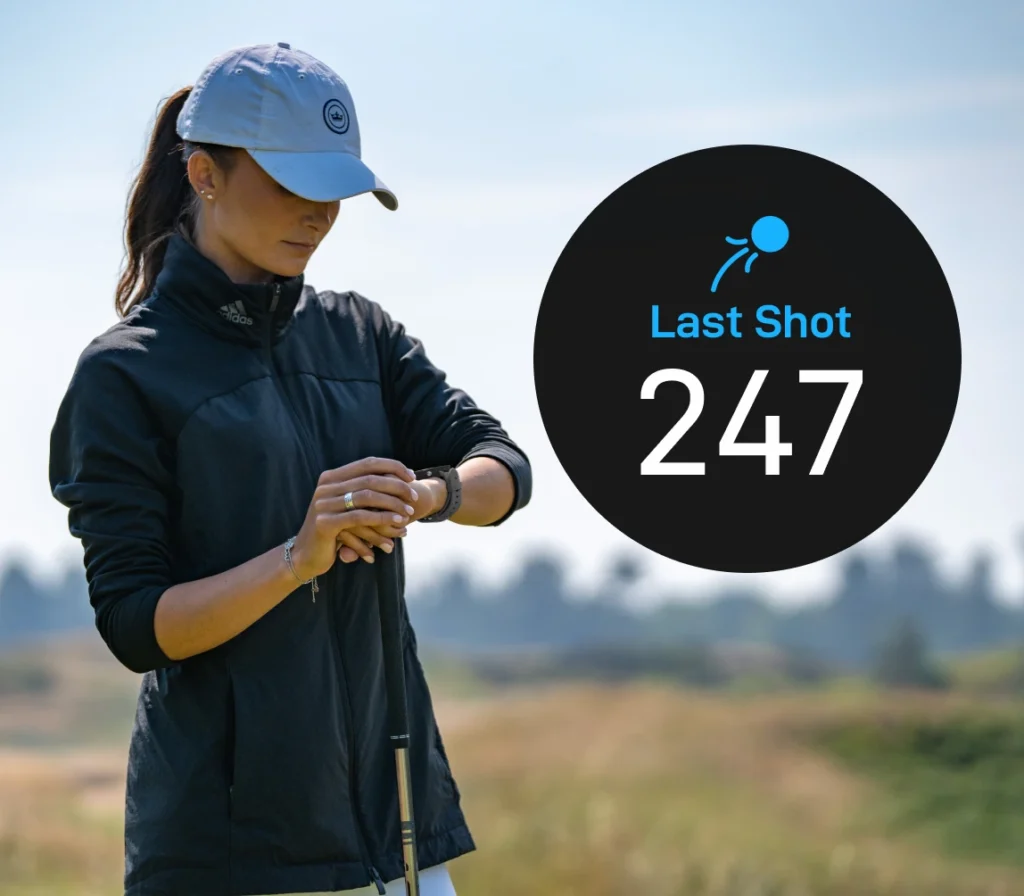 Golfer looking at last shot distance on their G6 watch
