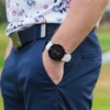 Golfer with hand in pocket with G6 on wrist